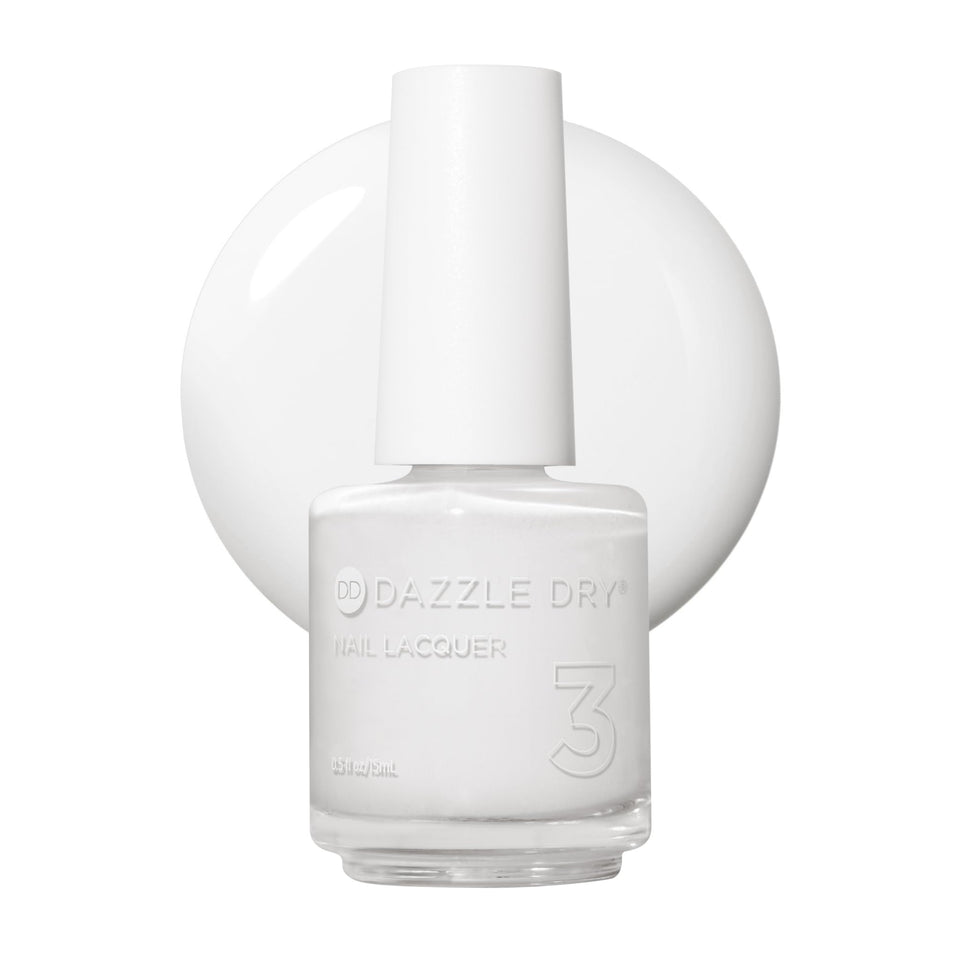 Dazzle Dry front bottle showing stark white lacquer and clear branding for confident color