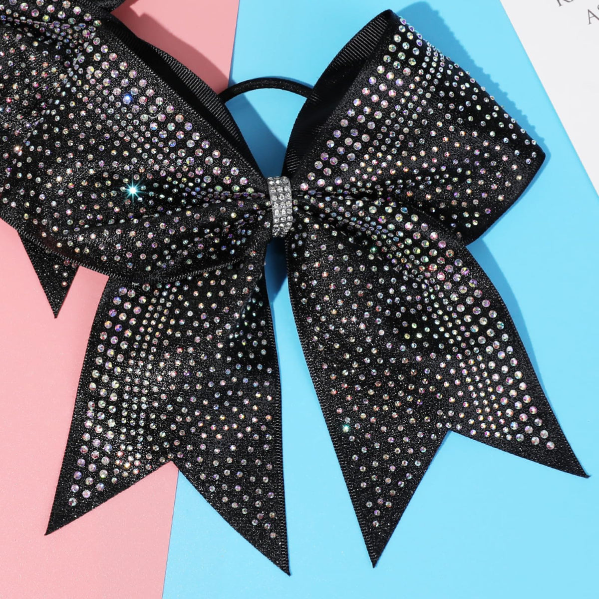 DEEKA bow worn in ponytail showing secure fit and comfortable hold