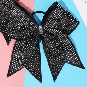 DEEKA bow worn in ponytail showing secure fit and comfortable hold