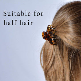 DEEKA clip securing a medium half-bun for quick styling