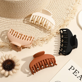 DEEKA clip holding half-up hairstyle illustrating secure everyday styling