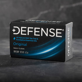 Defense Soap used after workout in bathroom showing post-exercise refresh