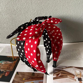 Deghew headband held in hands shows size and easy portability for on-the-go use