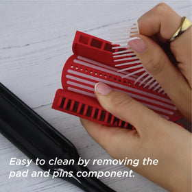 Detail of Denman brush handle showing comfortable grip and balanced styling control