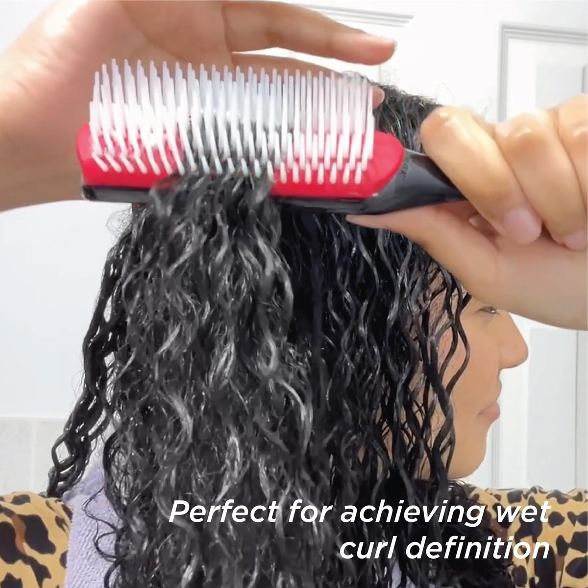 Denman D3 next to ruler displaying compact size suitable for medium-length hair