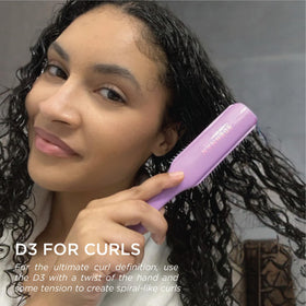 Denman D3 ergonomic tear-drop handle offering comfortable grip and better control