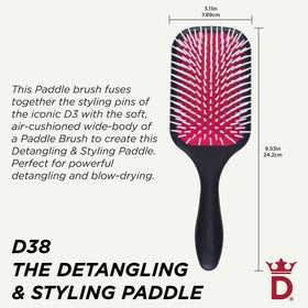 Denman close-up of rounded pin tips reducing snagging and protecting hair