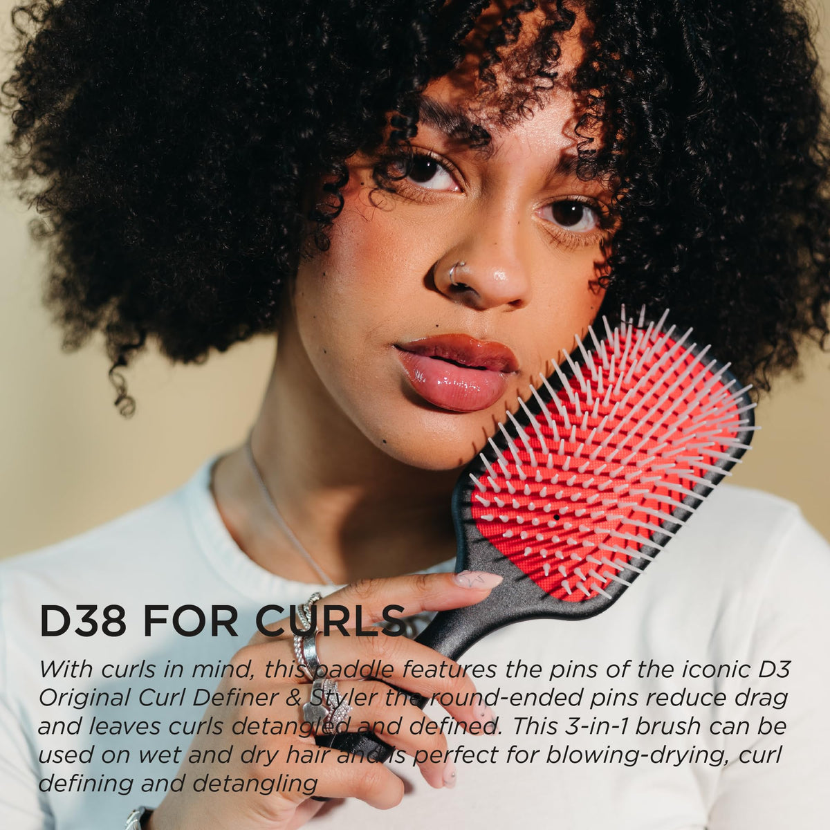 Denman side view of air-cushioned pad for gentle scalp pressure relief