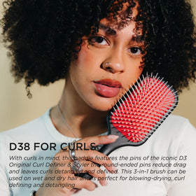 Denman side view of air-cushioned pad for gentle scalp pressure relief