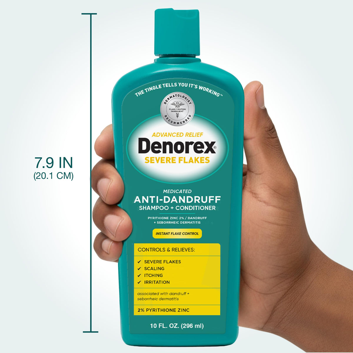 Denorex next to ruler showing 10 fl oz size for scale