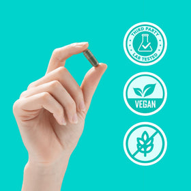 hand holding a DEOS capsule to illustrate single-dose daily use and portability