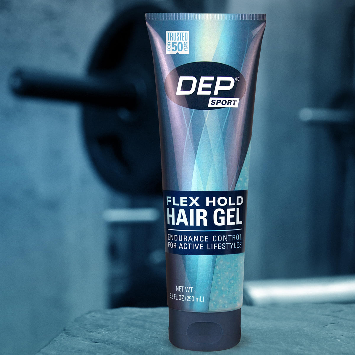 Dep gel beside a ruler to show 9.8 oz jar size and travel-friendly capacity