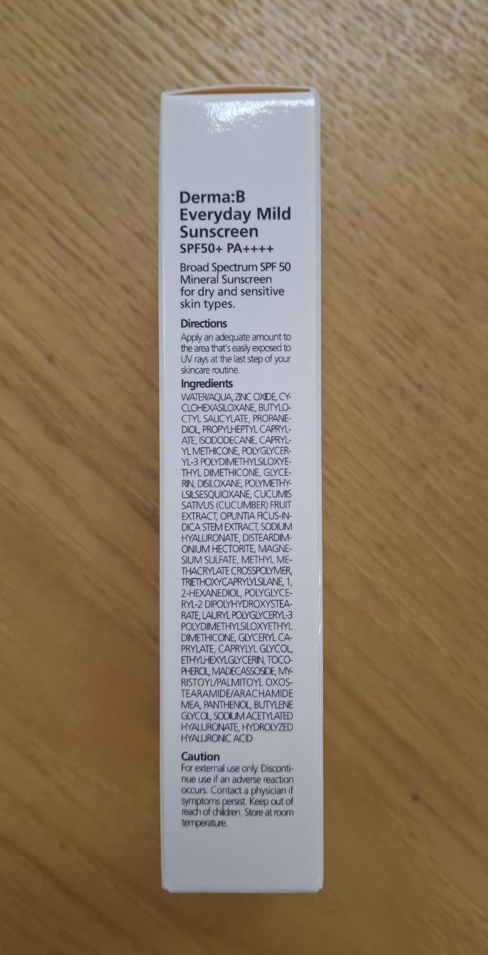 Derma B sunscreen spread on arm illustrating smooth coverage and protection