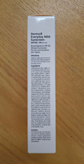 Derma B sunscreen spread on arm illustrating smooth coverage and protection