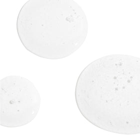 Derma E cleanser beside a 6 oz scale indicating true size and travel-friendly