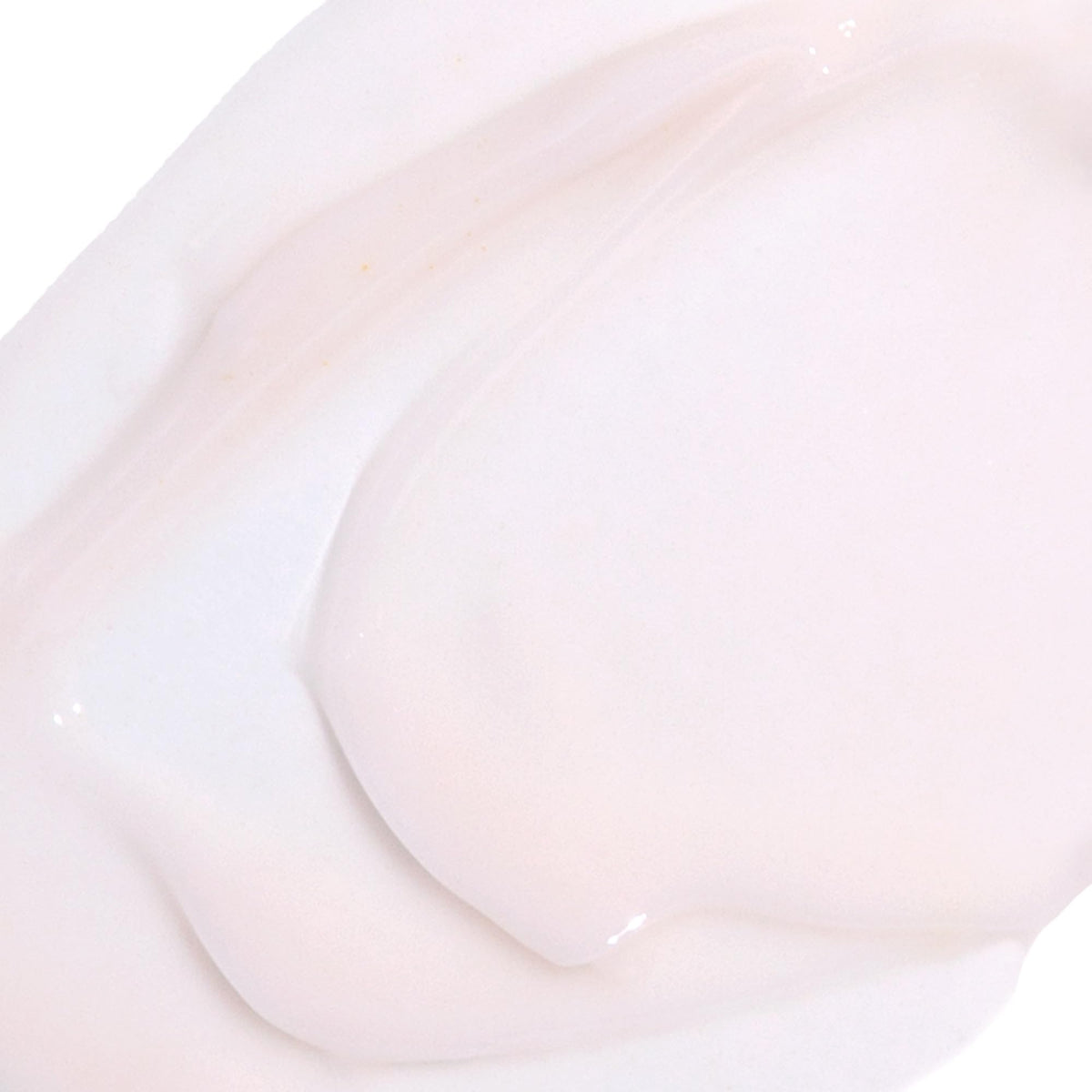 DERMA E applied on model’s cheek showing dewy luminous skin and healthy-looking glow benefit