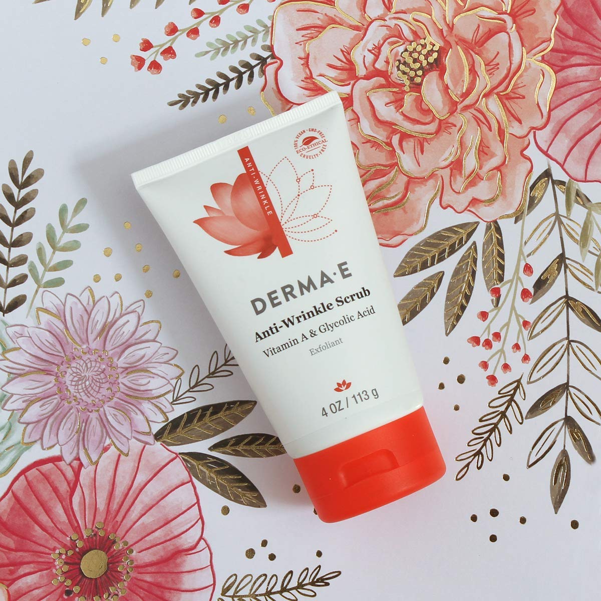 DERMA E jar held in hand demonstrating size and travel-friendly benefit