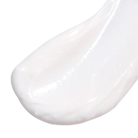 Derma E jar placed on bathroom vanity in lifestyle setting suggesting daily routine