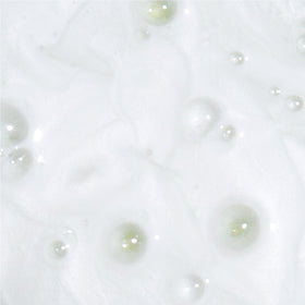 Derma E cleanser being rinsed from face for refreshed skin