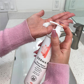 Derma E bottle styled next to towel suggesting routine ease