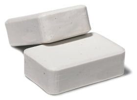 Dermaharmony bars on bathroom shelf staged to show daily routine compatibility