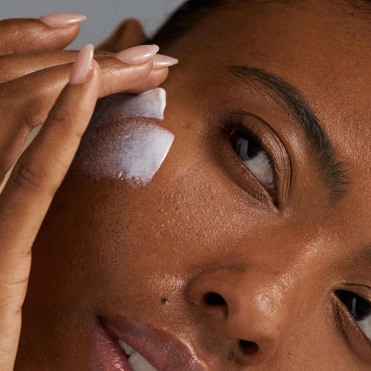 Dermalogica sunscreen blended on hand showing invisible finish and easy spread