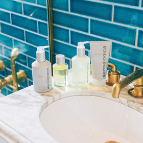 Dermalogica on bathroom shelf styled for spa-like routine and visual appeal