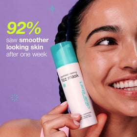 Hand applying Dermalogica Clear Start mask to cheek for clear pores