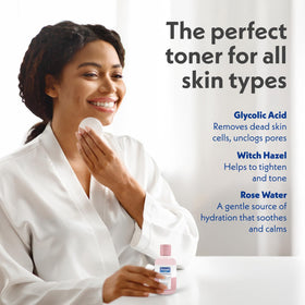Dermasil bottle held in hand for scale showing travel-friendly 4 oz size