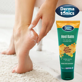 Dermatonics tube held in hand for scale highlighting compact 2.37 oz portability