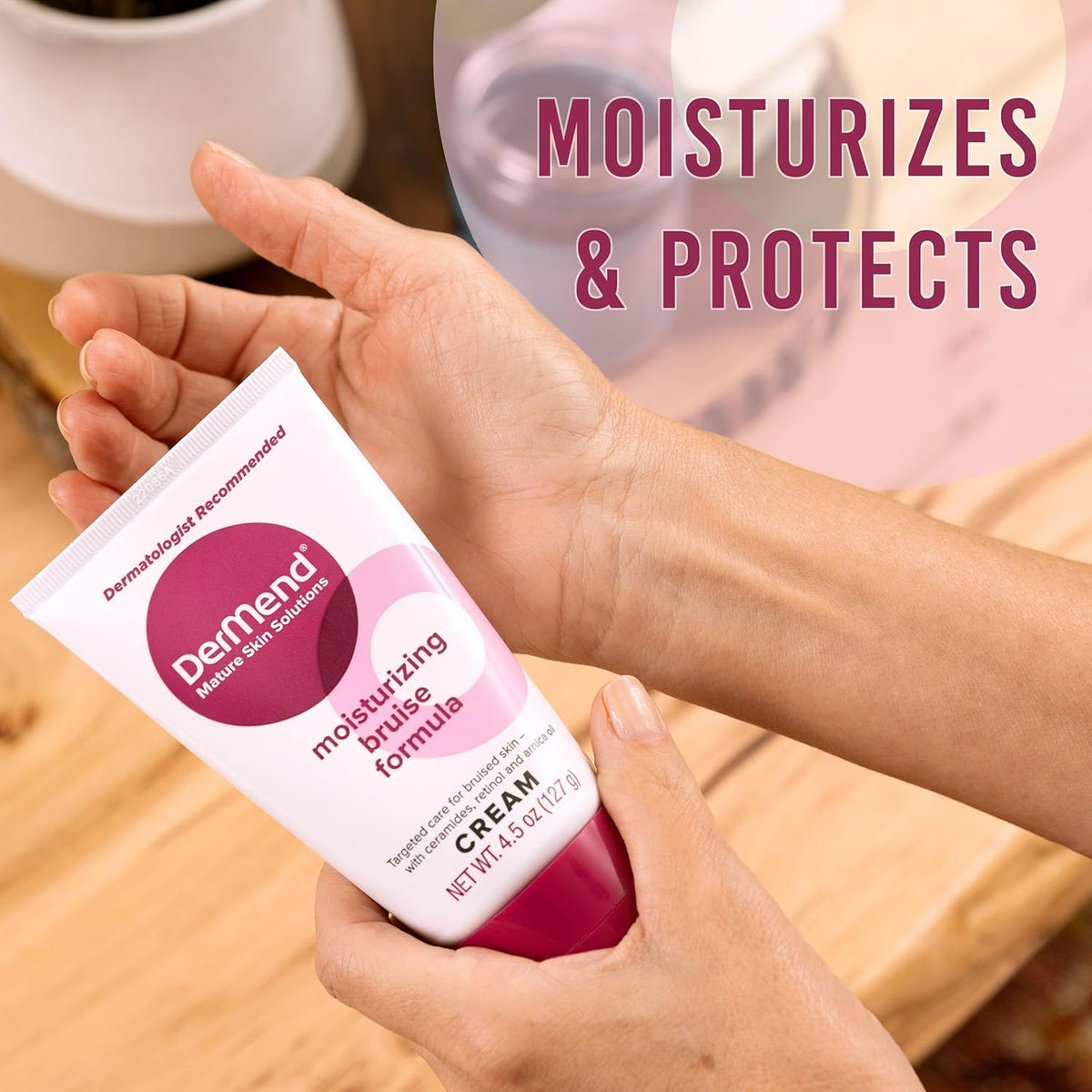 Dermend tube next to a hand for size comparison and easy daily-use benefit