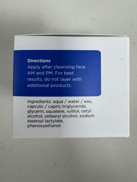 Dermgentle lifestyle shot at bathroom mirror during routine, showing everyday use and confidence benefit