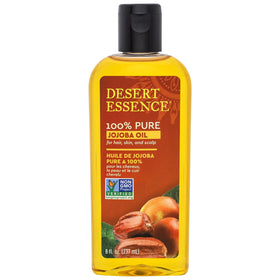 Desert Essence front bottle view showing clean packaging and pure oil benefit