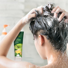 Desert Essence shampoo texture close-up highlighting lightweight lather for fuller hair