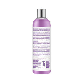 Design Essentials shampoo texture on hand showing creamy lather and hydration