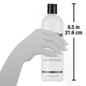 Design Essentials 16oz bottle held in hand showing product size and convenience
