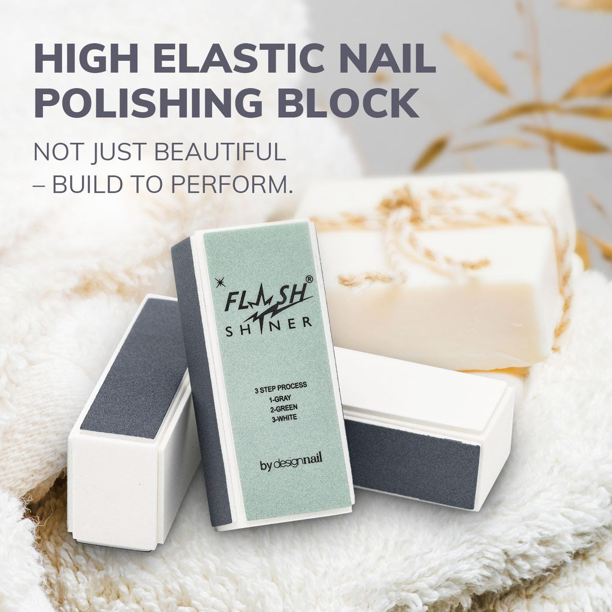 Design Nail buffer held in hand demonstrating size and ergonomic grip for easy home use