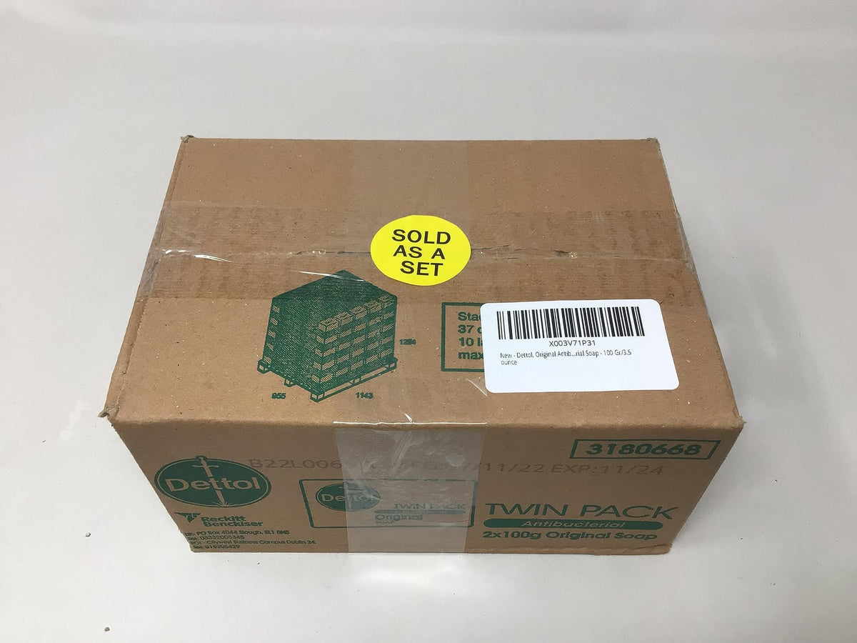 Dettol soap next to travel items showing compact 100g size for portability
