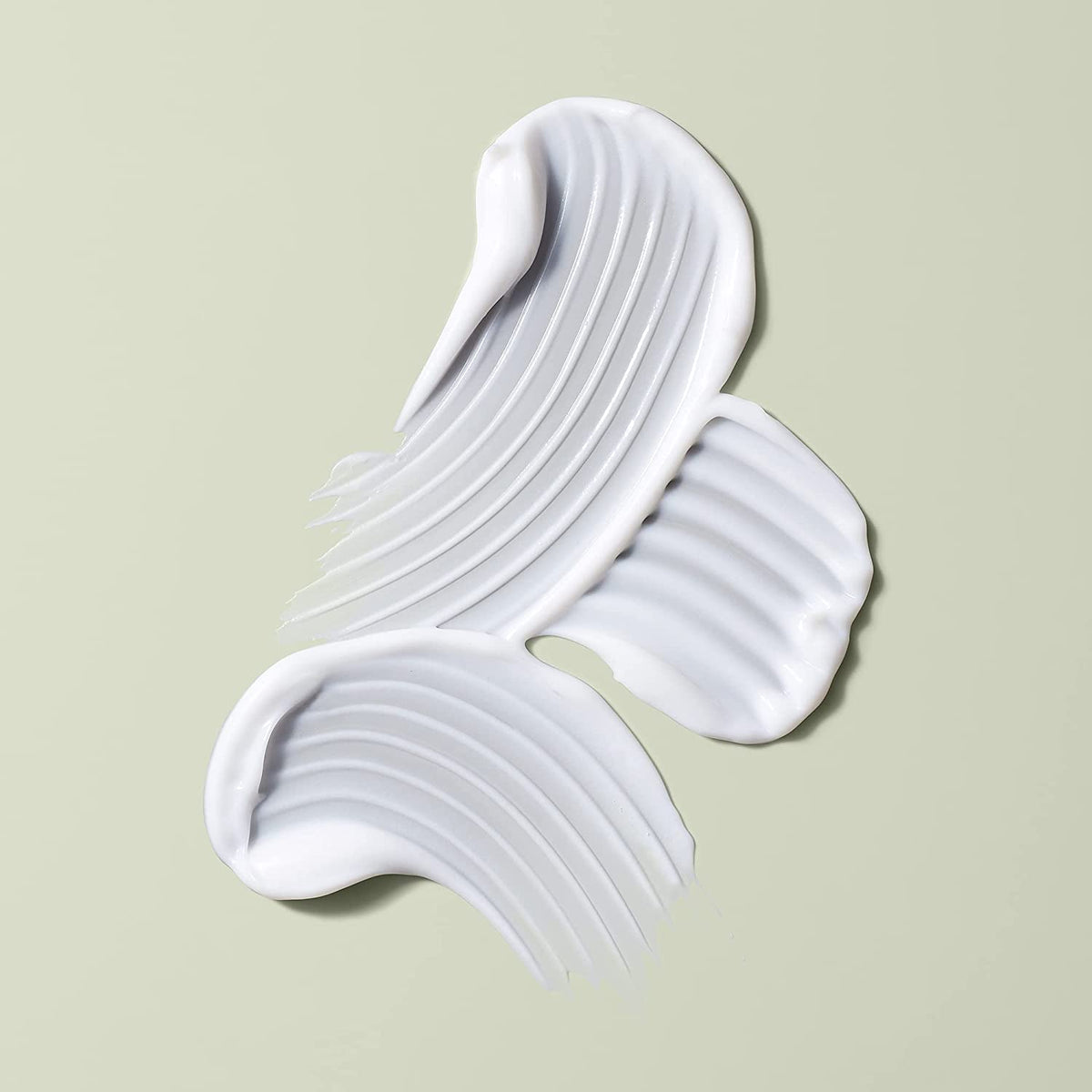 DevaCurl bottle on bathroom shelf conveying clean-beauty, vegan benefit