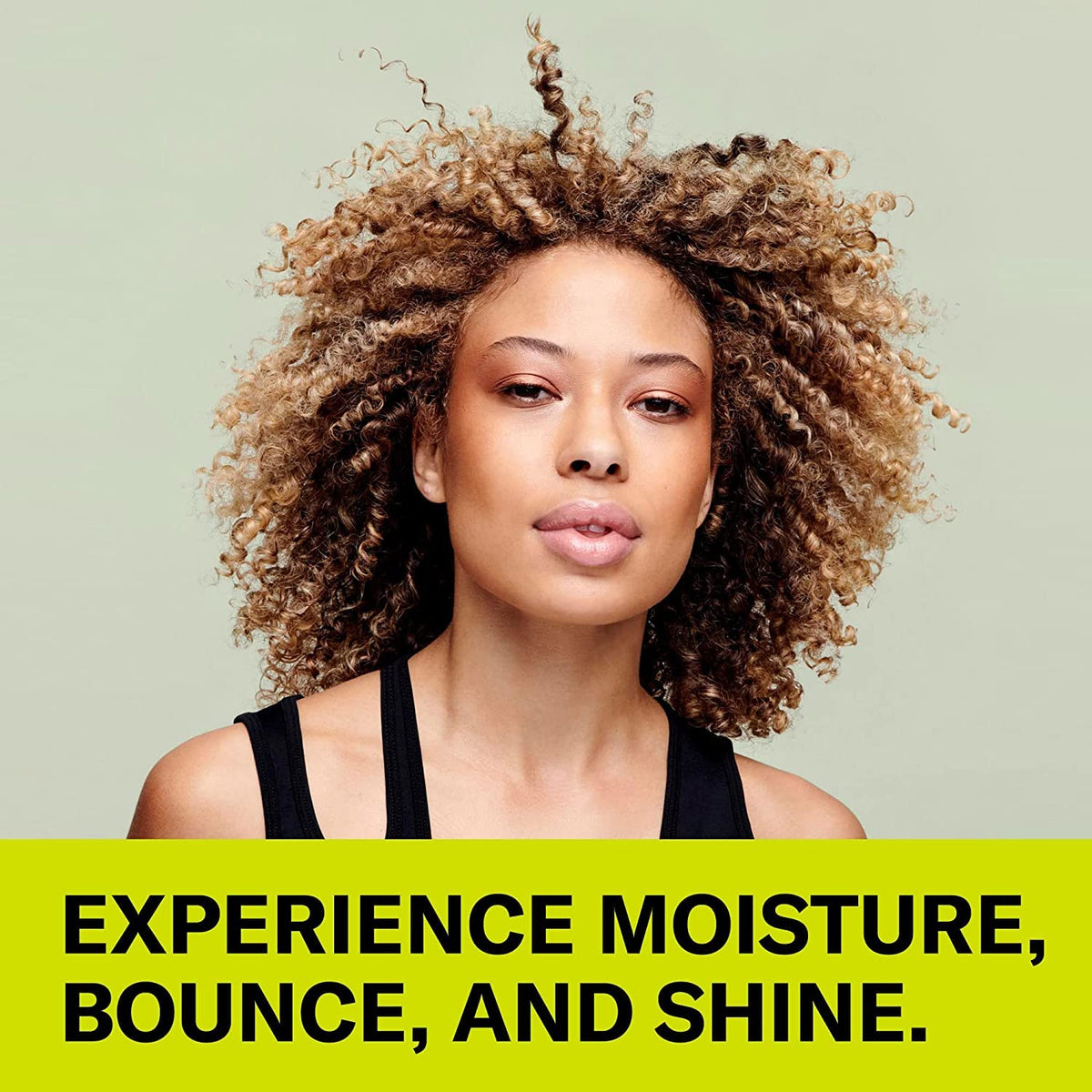 DevaCurl product dispensed in hand ready for application to damp hair for better styling