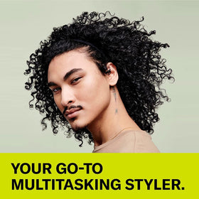DevaCurl product dispensed in hand demonstrating easy spreadability and hydration