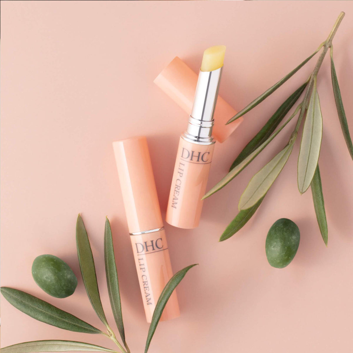 DHC lip cream cap open revealing smooth balm texture for easy glide
