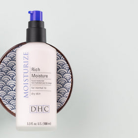 DHC application on cheek showing even hydration and non-greasy finish