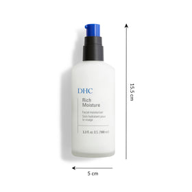 DHC cream on fingertip demonstrating smooth, lightweight spread