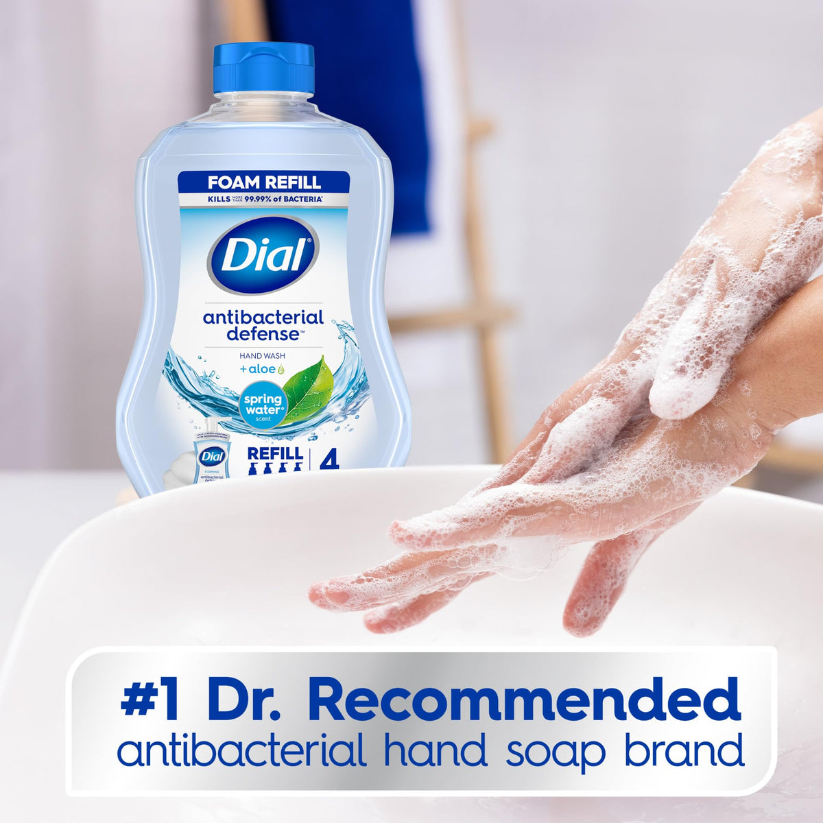 Dial 30 fl oz bottle next to a hand to show scale and refill capacity for multiple dispensers