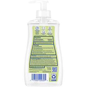 Dial bottle beside a soap dish demonstrating 11 fl oz size scale