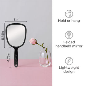 Diane close detail of handle and hang hole demonstrating easy storage benefit