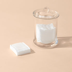 Diane pad soaked with nail polish remover showing sturdy lint-free removal