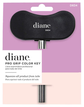 Diane Pro Grip Color Key next to a tube for scale, showing compact size and space-saving storage