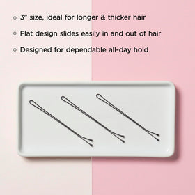 Diane pins securing a bun in use showing stable updo hold benefit